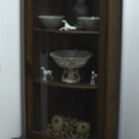 Curio Cabinet with Various Collectible Items